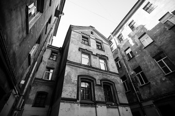 View of house court yard in the historic center of St. Petersburg, Russia. Black and white photo.