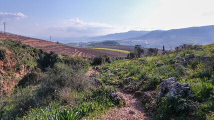 View of Hula valley and Naftali mountains as seen from upper Ayun stream trail, near the town of Metula in Upper Galilee, Northern Israel, Israel.