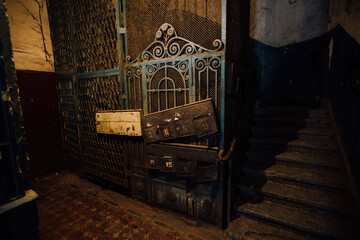 Old vintage rusty elevator gates in old mansion © Mulderphoto