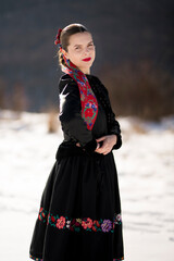 Young beautiful slovak woman in traditional dress. Slovak folklore