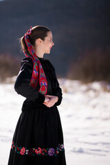Young beautiful slovak woman in traditional dress. Slovak folklore