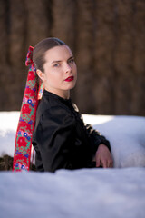 Young beautiful slovak woman in traditional dress. Slovak folklore