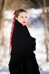 Young beautiful slovak woman in traditional dress. Slovak folklore