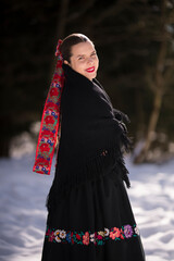 Young beautiful slovak woman in traditional dress. Slovak folklore