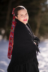 Young beautiful slovak woman in traditional dress. Slovak folklore