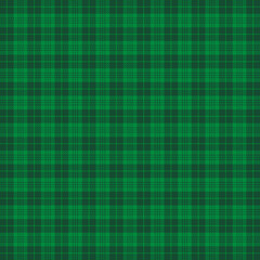 St. Patricks day tartan plaid. Scottish pattern in green and dark green cage. Scottish cage. Traditional Scottish checkered background. Seamless fabric texture. Vector illustration