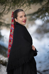 Young beautiful slovak woman in traditional dress. Slovak folklore