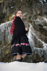 Young beautiful slovak woman in traditional dress. Slovak folklore