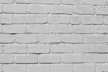 Obraz premium Light gray brick wall. Textured background. Natural light
