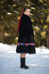 Young beautiful slovak woman in traditional dress. Slovak folklore