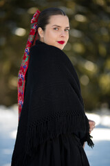 Young beautiful slovak woman in traditional dress. Slovak folklore