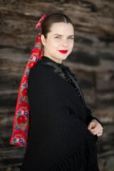 Young beautiful slovak woman in traditional dress. Slovak folklore