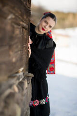 Young beautiful slovak woman in traditional dress. Slovak folklore