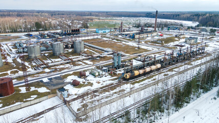 Panoramic view of street asphalt factory company. Industry bitumen storage from above. Production of bitumen. Petrochemical industry concept.