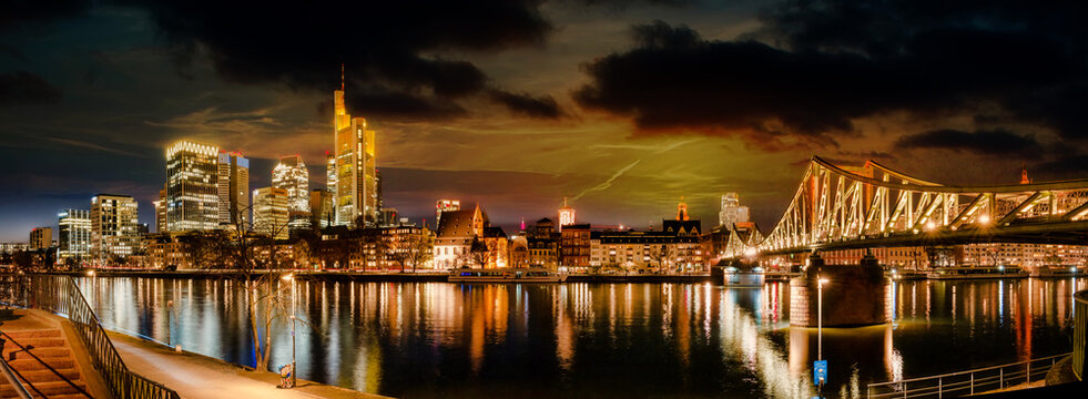 Picturesque view of Frankfurt am Main skyline and Eiserner Steg bridge with love locks