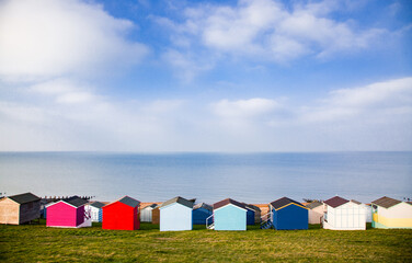 Fototapeta na wymiar row of beach huts in Tankerton near Whitstable in Kent - British summer