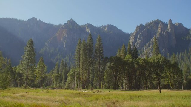 Pan Around Shot of Sun Shining Over Yosemite National Park in California