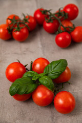 Fresh red cherry tomatoes on the table