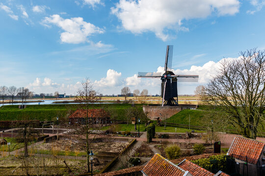 Windmill along the river Bergsche Maas in Heusden, Noord Brabant - The Netherlands - Europe