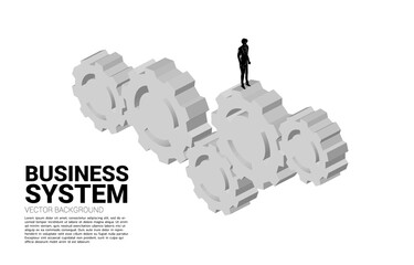 Silhouette of businessman standing on multiple big gear. concept of business management and control