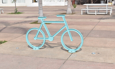 Bicycle station in the shape of a bicycle in Acapulco in an open park