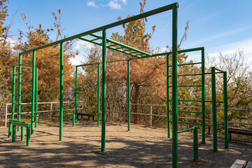 Playground in a public park. Positive emotions, spring sunny day.