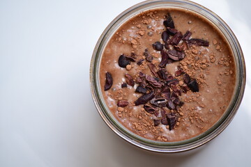 Creamy chocolate smoothie with cacao nibs and cocoa