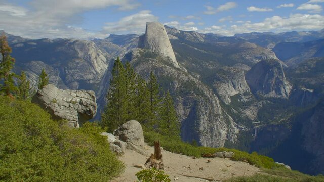 Panning Past Young Woman Enjoying the View at Yosemite National Park