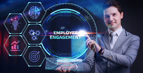 Business, Technology, Internet and network concept. Young businessman working on a virtual screen of the future and sees the inscription: Employee engagement