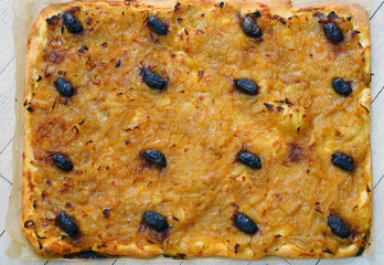 A French pissaladiere tart with onions and black olives