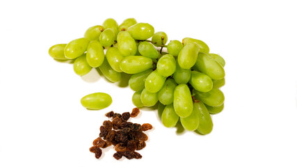 bunch of green grapes and some raisins