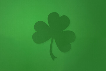 St Patricks day background. Shamrock clovers . With paper texture.