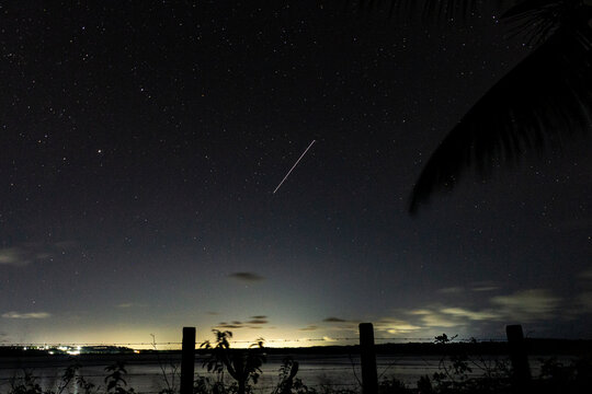 Long exposure photography at night. Light trail that leaves the space station in 30 seconds.