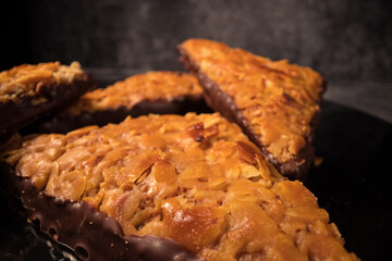 Close-up shot of nut triangles with almonds - a German specialty - food photography