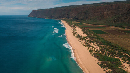 aerial drone over polihale beach showing reef