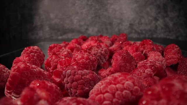 Fresh raspberries in close-up - macro sliding shot- food photography