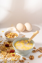 A simple nutritious breakfast on a solid color background