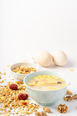 A simple nutritious breakfast on a solid color background