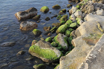 Stone beach. Pali town on the Nisyros island. Greece.