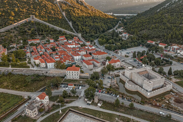 Aerial drone shot of walled city of Ston near Ragusa Dubrovnik in Croatia summer sunrise