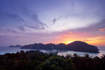 Wonderful sunset on Phi Phi Don island view point. Beautiful landscape with tropical sea lagoon.