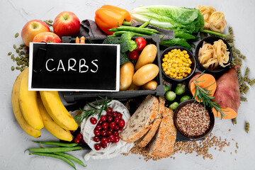 Best sources of carbs on light gray background. Healthy food concept.