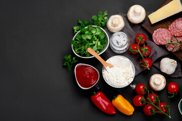 Italian pizza preparation. Variety of traditional cooking ingredients.