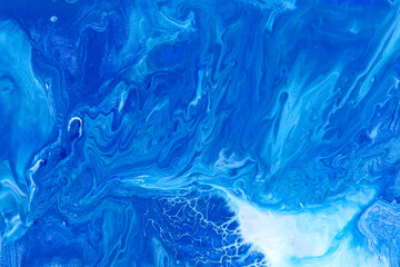 Abstract acrylic blue background. Fluid art illustration with swirl patterns. Liquid marble texture. Modern backdrop