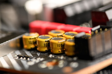 Audio capacitors on the computer motherboard. Audio system for pc. Computer processor, cpu. Technology Concept