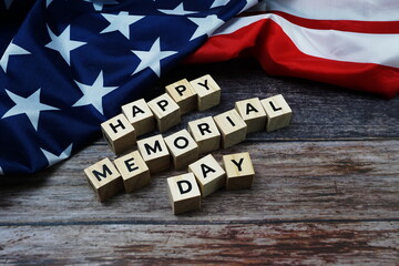 Fototapeta na wymiar Happy Memorial Day Word alphabet letters with USA flag on wooden background