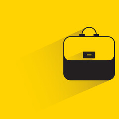 briefcase with shadow on yellow background