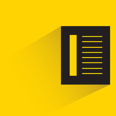 document with shadow on yellow background