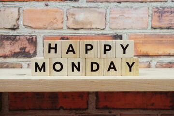 Happy Monday alphabet letter on shelves wooden background
