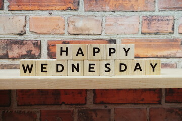 Happy Wednesday alphabet letter on shelves wooden background